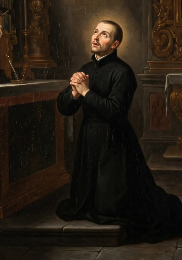 Święty Franciszek Caracciolo klęczący w głębokim skupieniu i modlitwie.